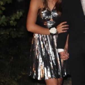 Metallic dress great for homecoming or party’s. Bought for $180 asking $130 obo.